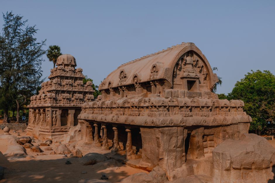 The monolithic Five Rathas temples carved from single granite boulders at Mahabalipuram