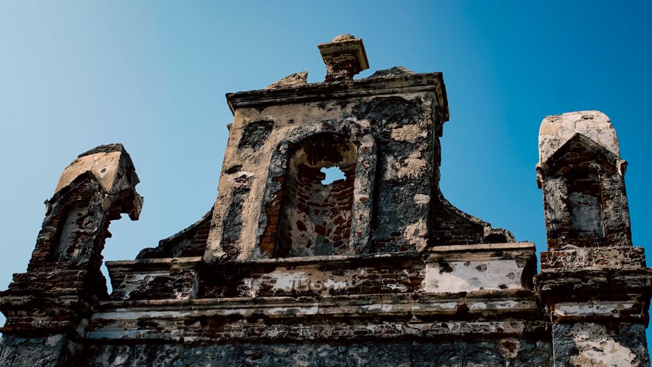 Ruined stone walls of the abandoned town of Dhanushkodi at the tip of Rameswaram, sea on both sides