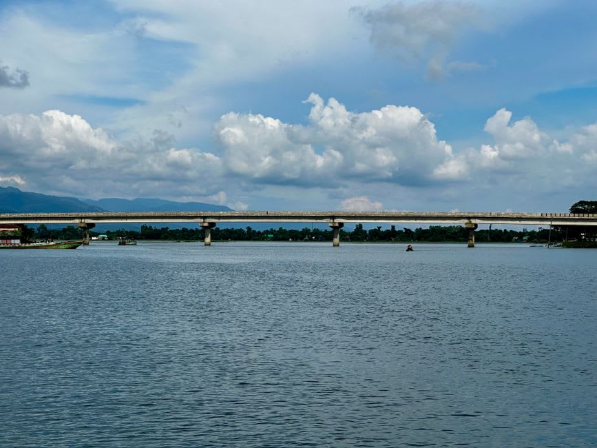 Ward's Lake in Shillong with its wooden footbridge reflected in still water