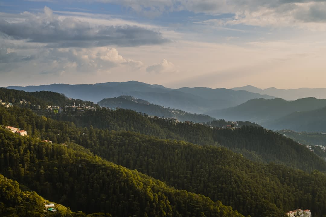 Christ Church's neo-Gothic spire above Shimla's Ridge with the Himalayas beyond