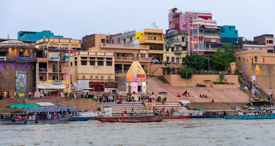 The ancient ghats of Varanasi with boats on the Ganges at dawn