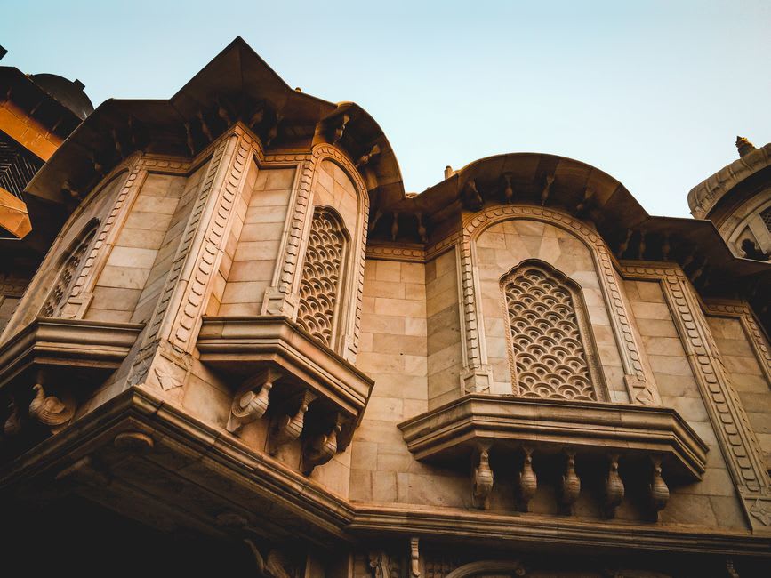 The white domes and spires of the ISKCON temple complex in Vrindavan