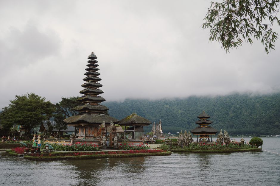 Pura Ulun Danu Bratan temple reflected in the misty water of Lake Bratan