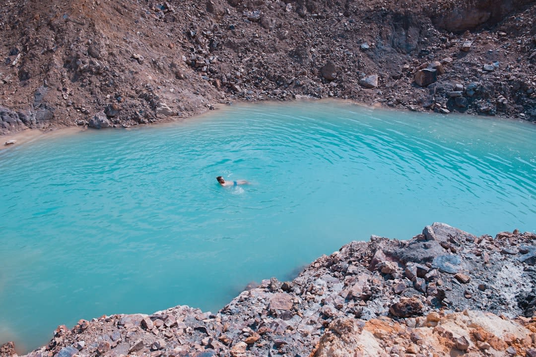 Turquoise crater lake Segara Anak seen from the rim of Rinjani
