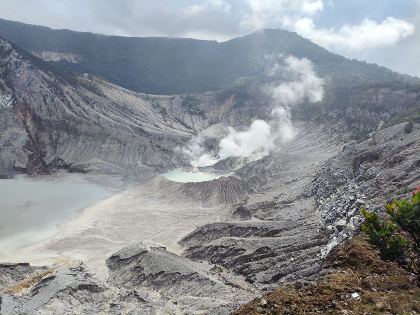 Steaming sulfur crater rim at Tangkuban Perahu volcano near Lembang