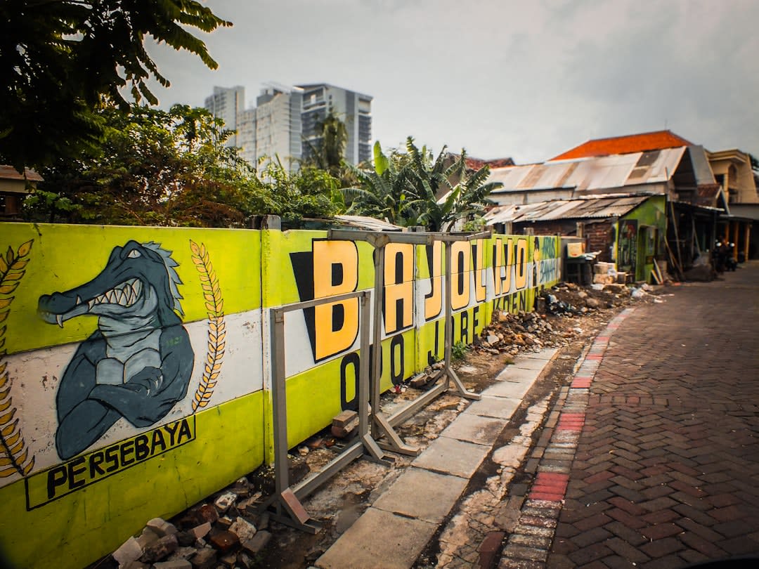 Narrow lane in Surabaya's Kampung Arab near Ampel Mosque lined with spice and perfume stalls