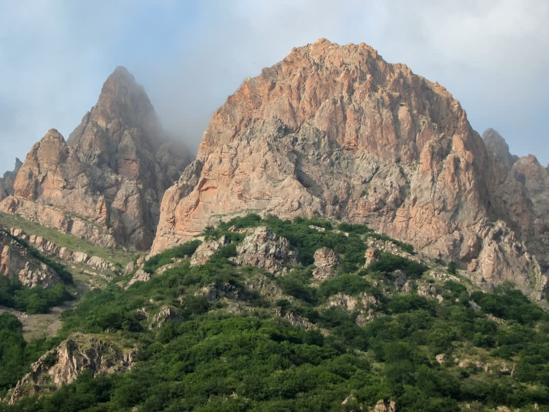 The Chalus Road descending through cloud-wrapped green mountains toward the Caspian coast
