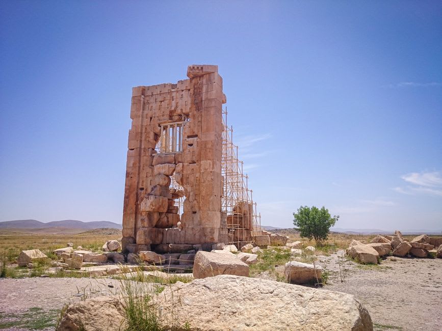Weathered stone column bases and channel remains marking the layout of Cyrus's palace gardens at Pasargadae