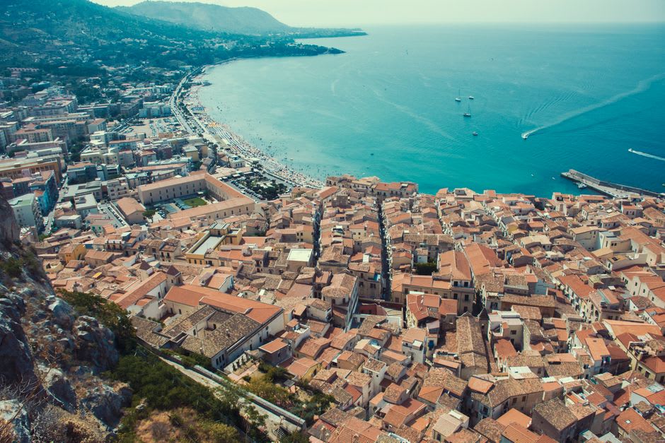 View from La Rocca down over Cefalù's rooftops and cathedral to the sea