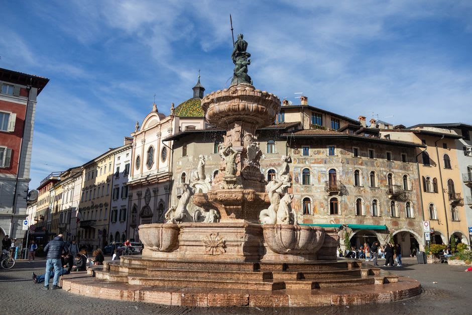 Frescoed Renaissance facades ringing Trento's Piazza Duomo