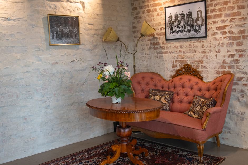 Historic coffeehouse interior in Trieste with marble tables and Habsburg-era decor