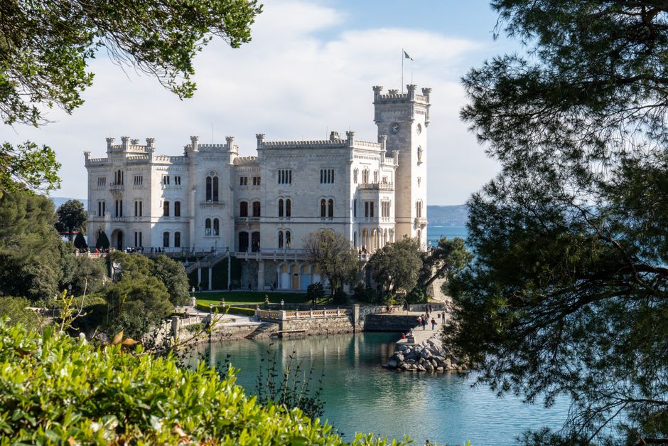 Miramare Castle perched on its rocky promontory above the Gulf of Trieste