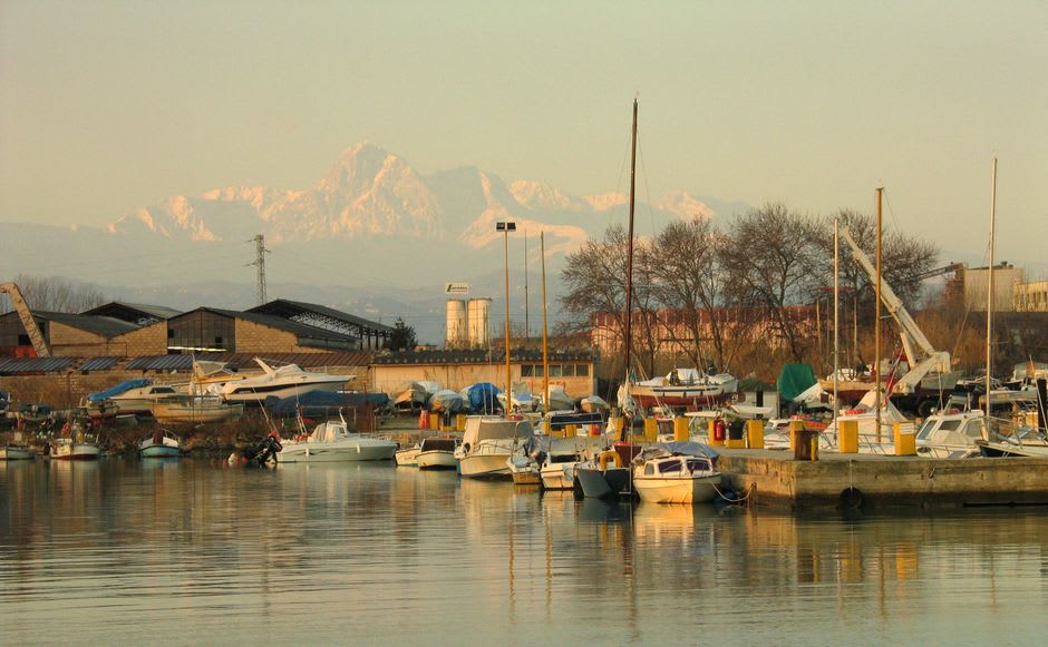 Fishing boats moored at Pescara's harbor in the early morning