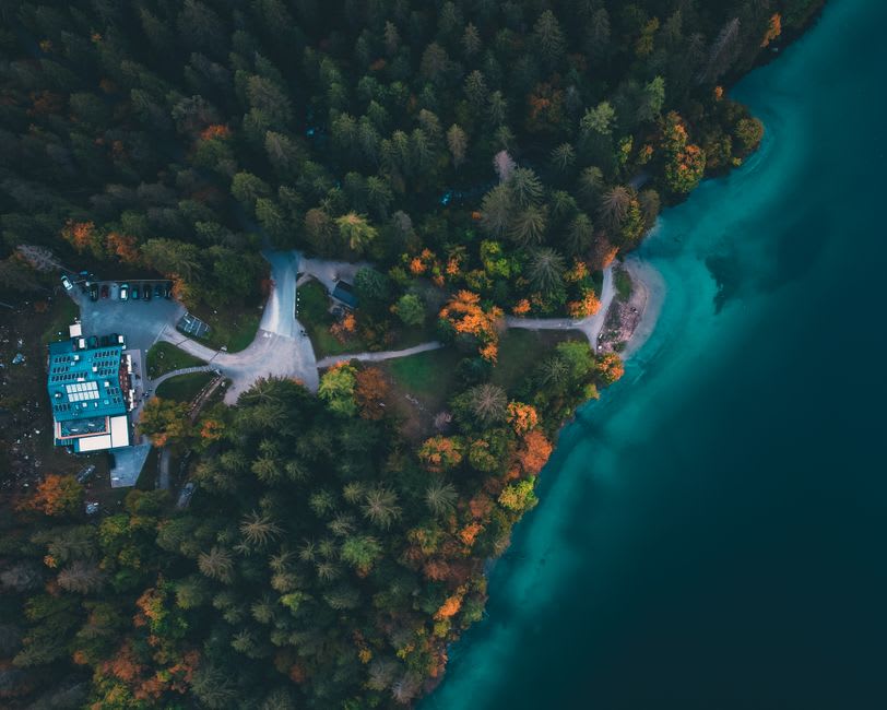 Lago di Scanno seen from above, ringed by forested mountains