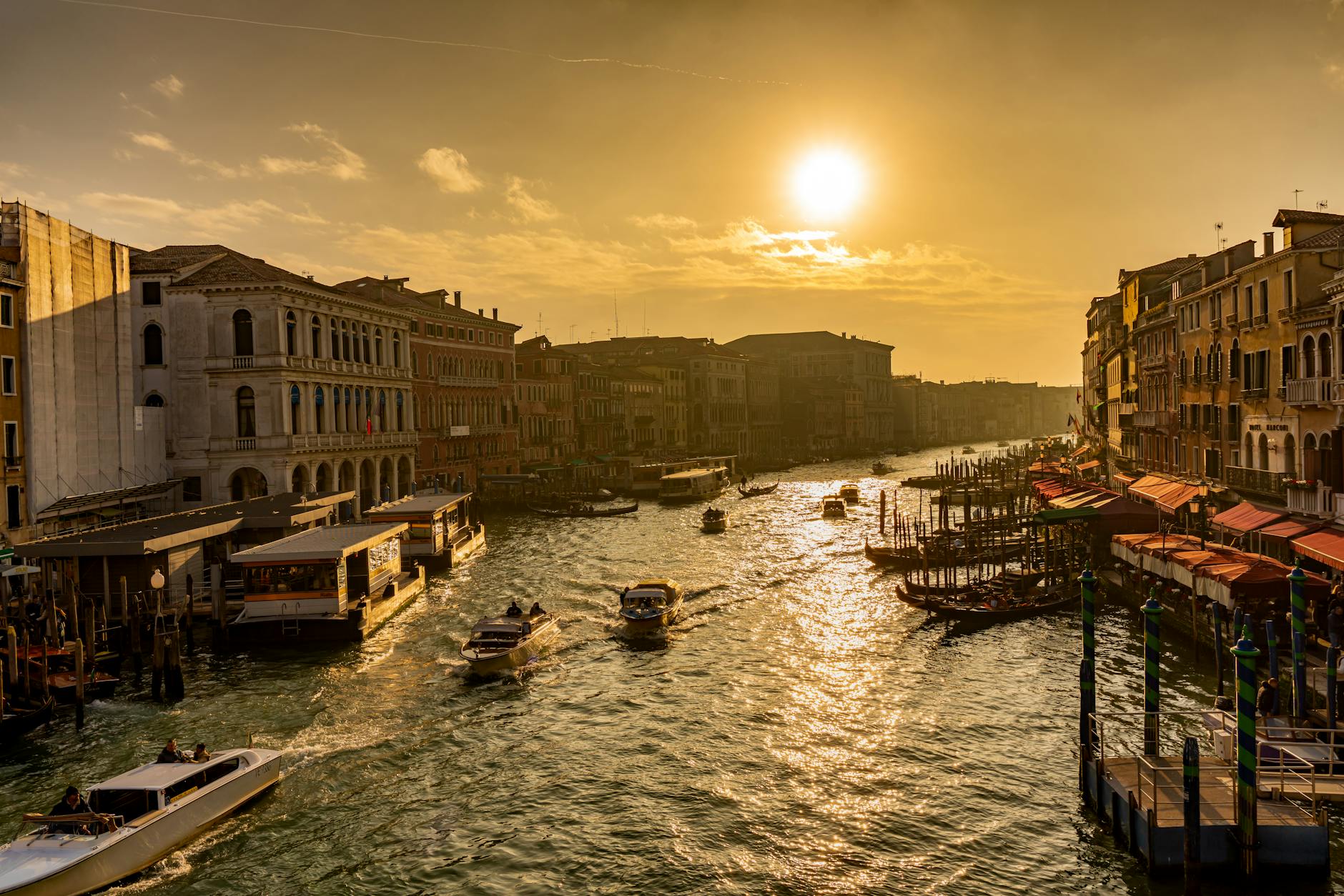 The Grand Canal at sunset with gondolas and historic Venetian palazzi