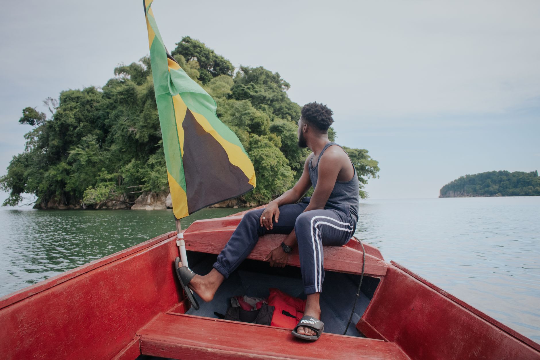The valley near Accompong in Cockpit Country — morning mist filling the karst hollows, the forest silent and extraordinarily green
