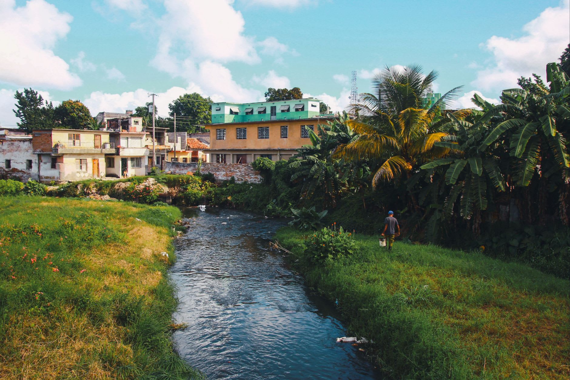 Trench Town Culture Yard — the original government yard where the Wailers rehearsed, the concrete walls covered in photographs and murals