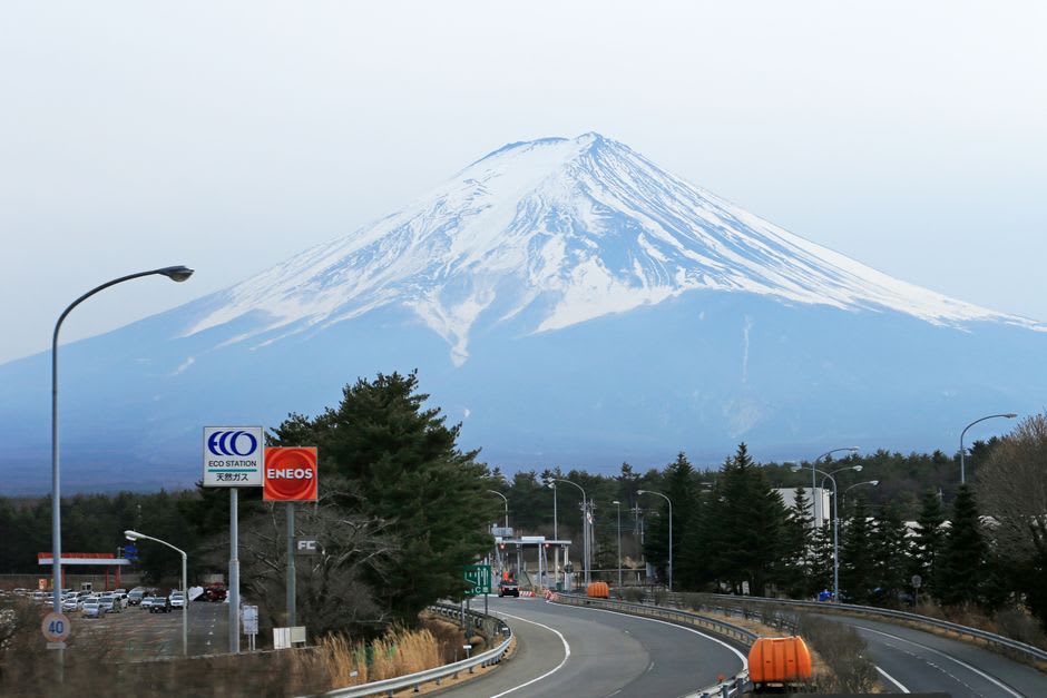 The Gotemba Trail trailhead on the lower eastern slope of Mount Fuji with cloud spilling over the ridge