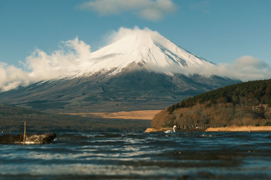 Perfect cone of Mount Bandai doubled in the still winter surface of Lake Inawashiro