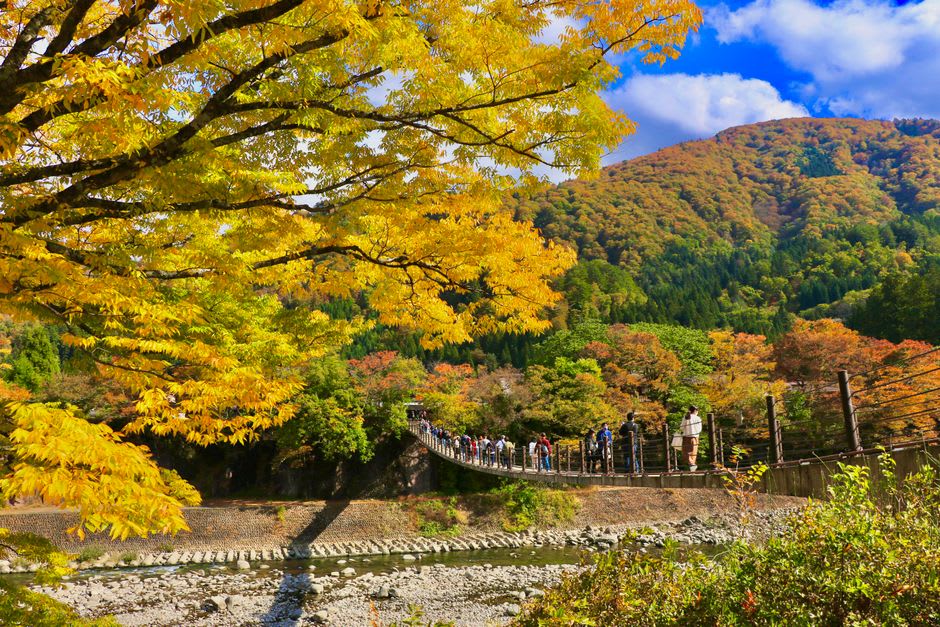 Riverside open-air hot spring baths beside a mountain stream at Takaragawa Onsen