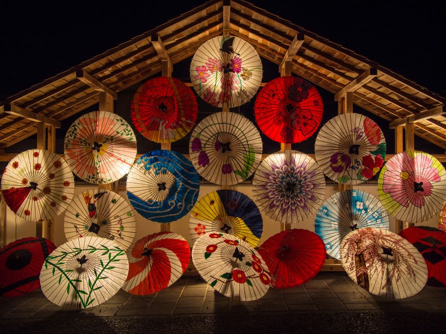 A close view of a delicate gold washi-paper lantern of the Yamaga festival