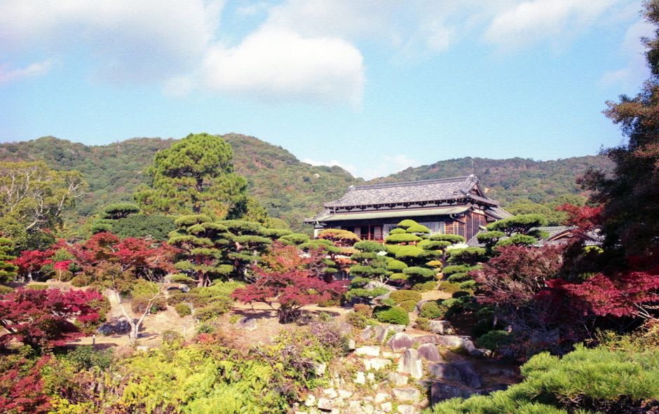 The twin concrete towers of the Xavier Memorial Cathedral on a hill in Yamaguchi