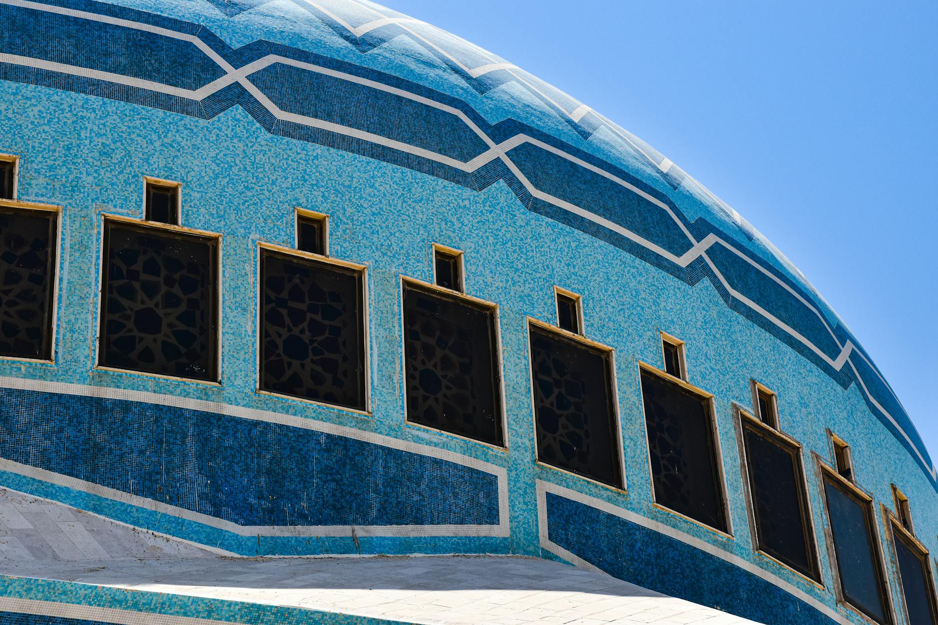 Ancient mosaic artwork with intricate geometric patterns in Madaba