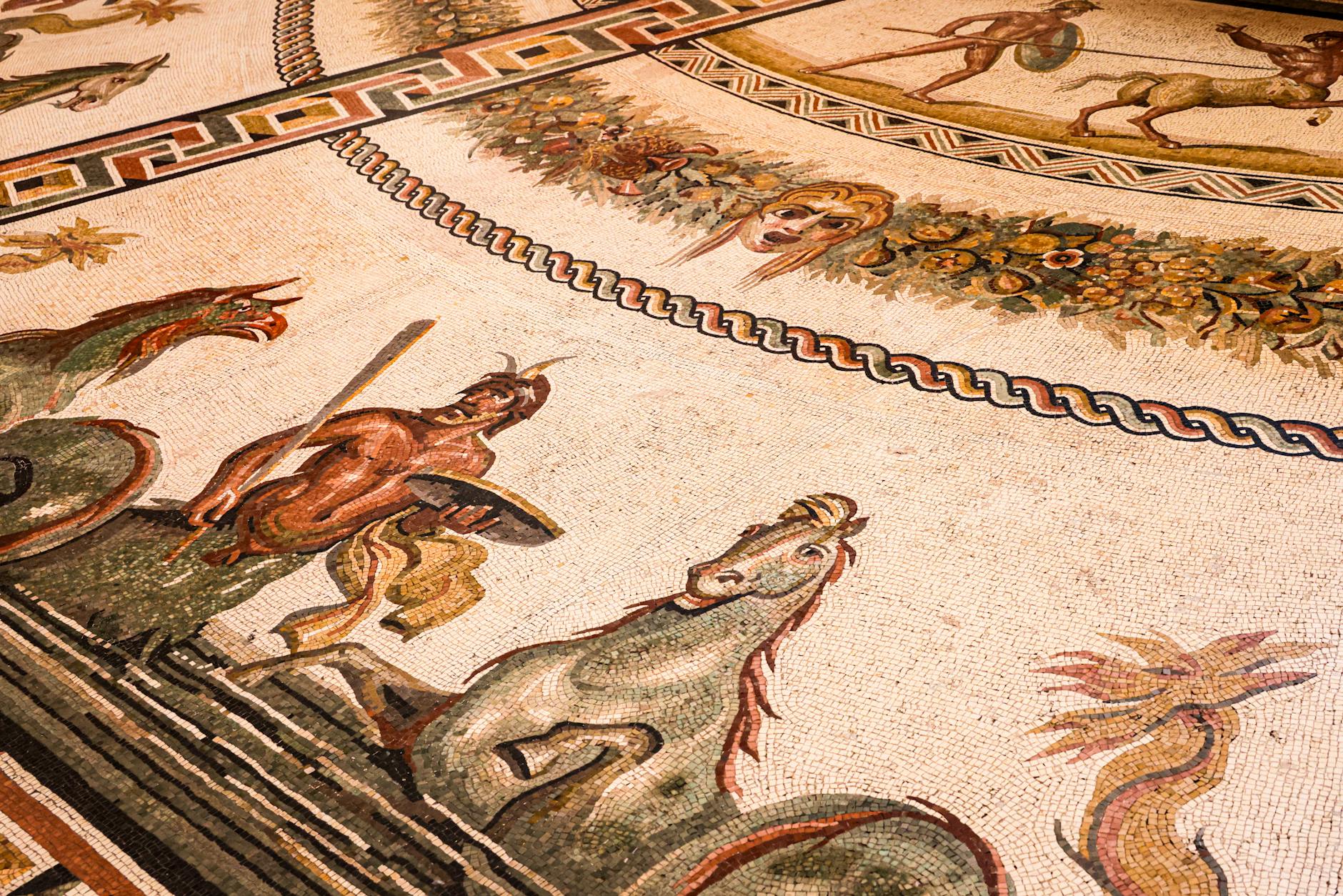 Ancient mosaic artwork depicting mythological scenes in Madaba