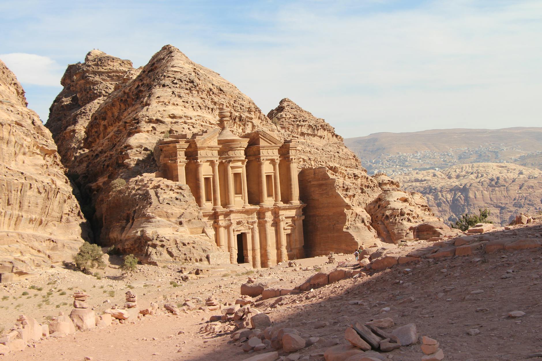Ancient carved tombs and rock formations in the valley of Petra