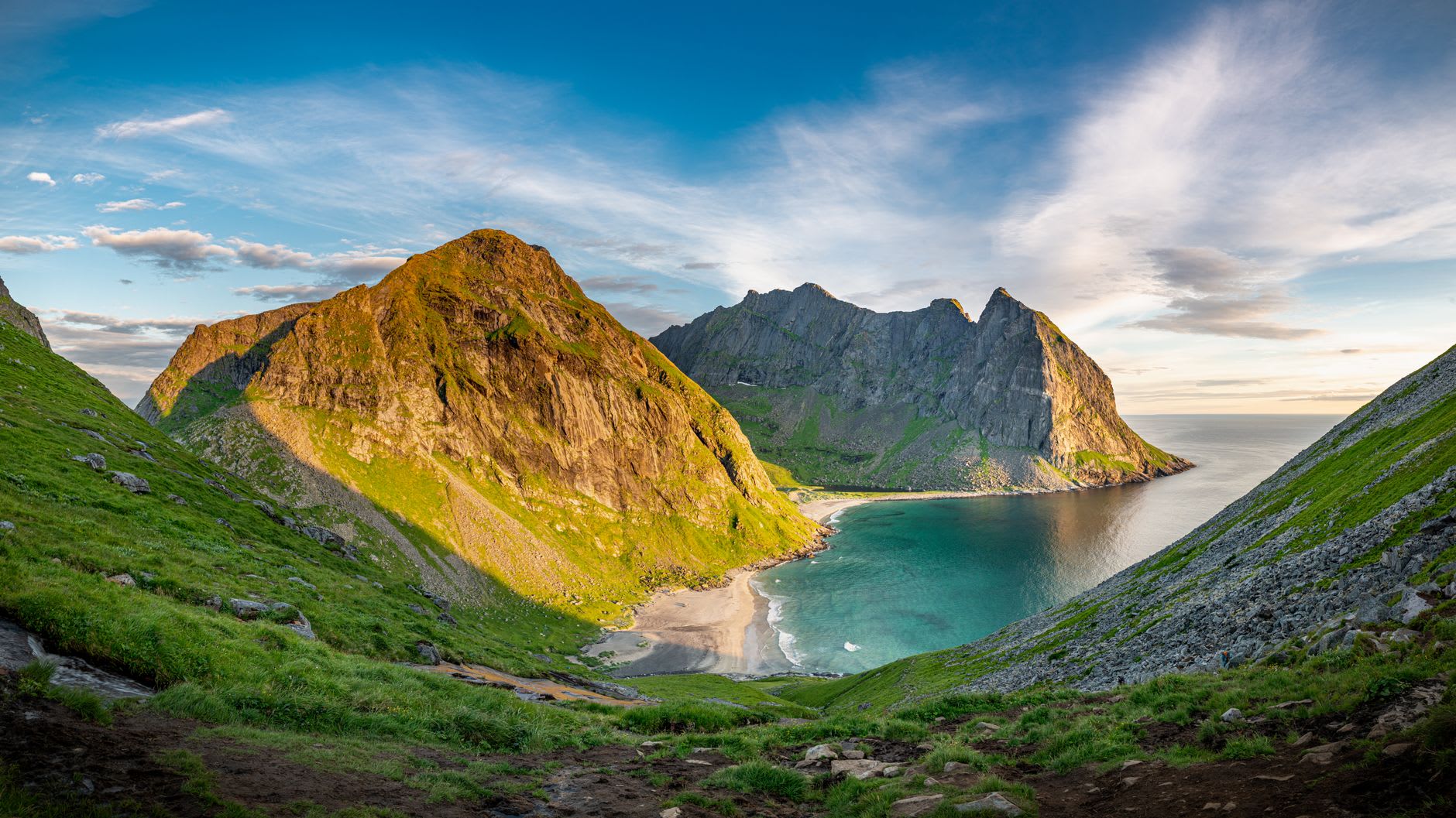 The view from Ryten summit down onto the curved beach far below