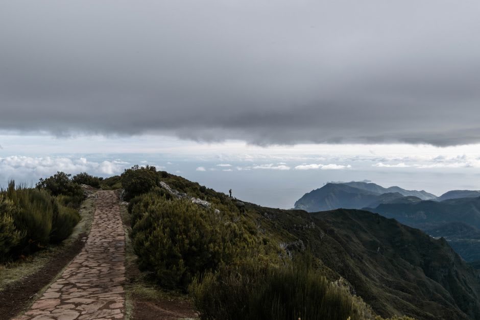 View of Curral das Freiras crater village from the Eira do Serrado viewpoint at sunrise