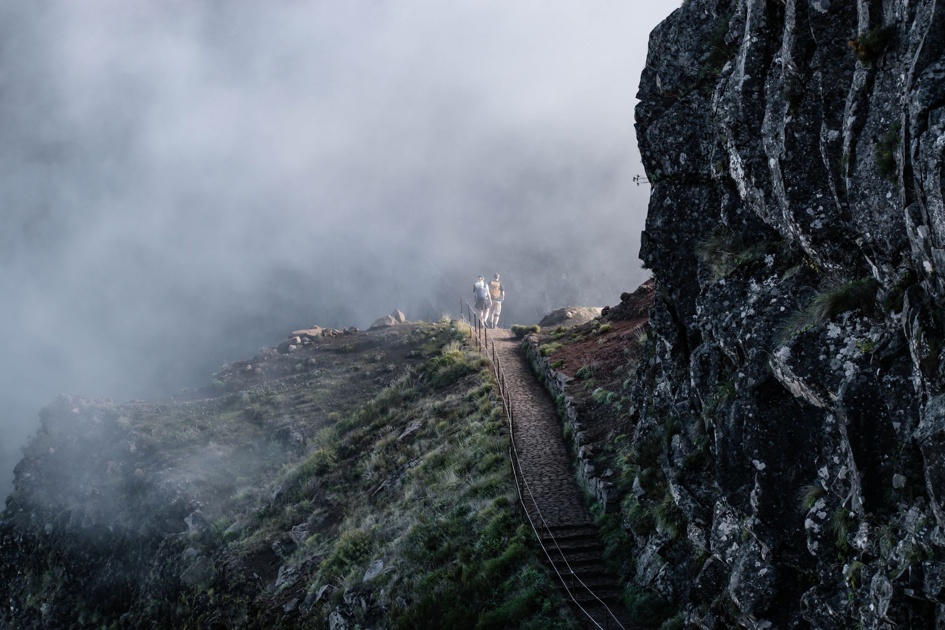 Dawn light over Madeira's volcanic peaks from Pico do Arieiro, the cloud sea filling the valleys below like a second ocean