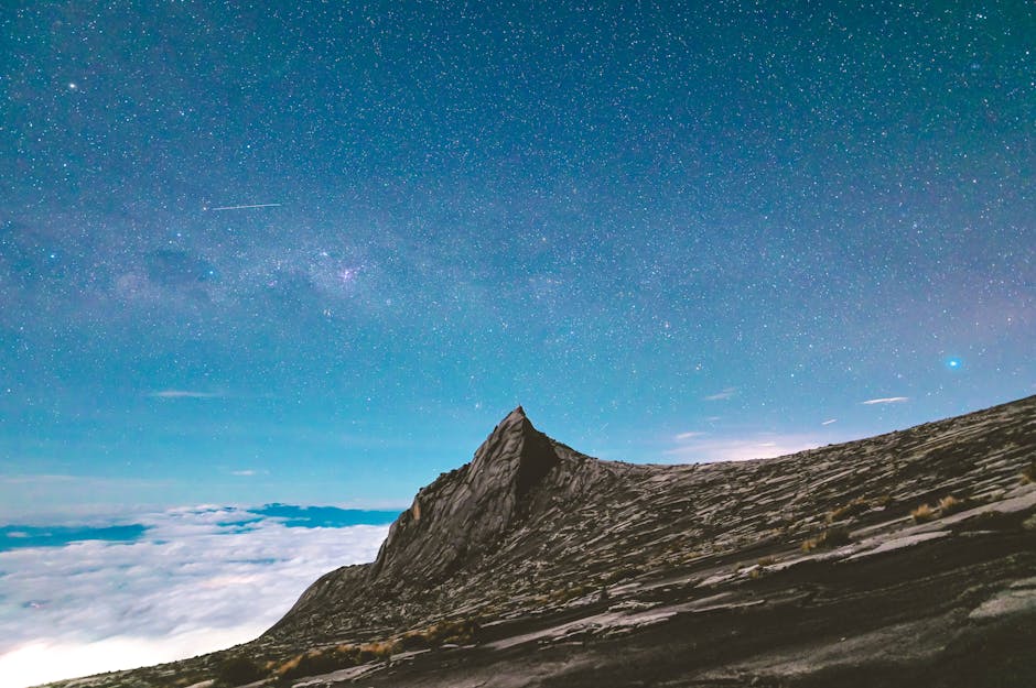 Mount Kinabalu rising above the clouds at sunrise