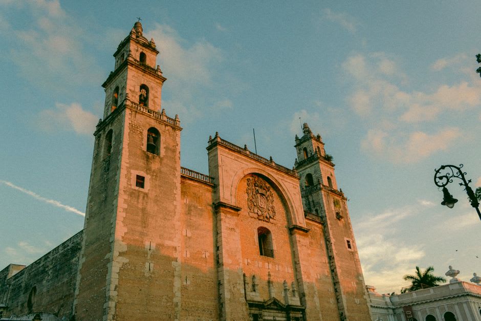 A street in Acanceh showing painted colonial facades near the central plaza