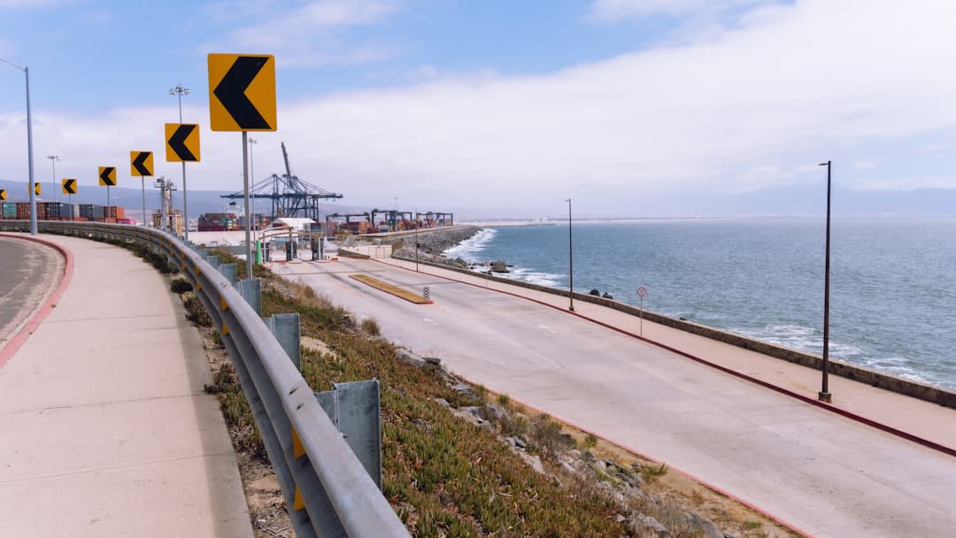 Food and taco stalls lining the narrow corridor leading down to La Bufadora, Ensenada, Baja California