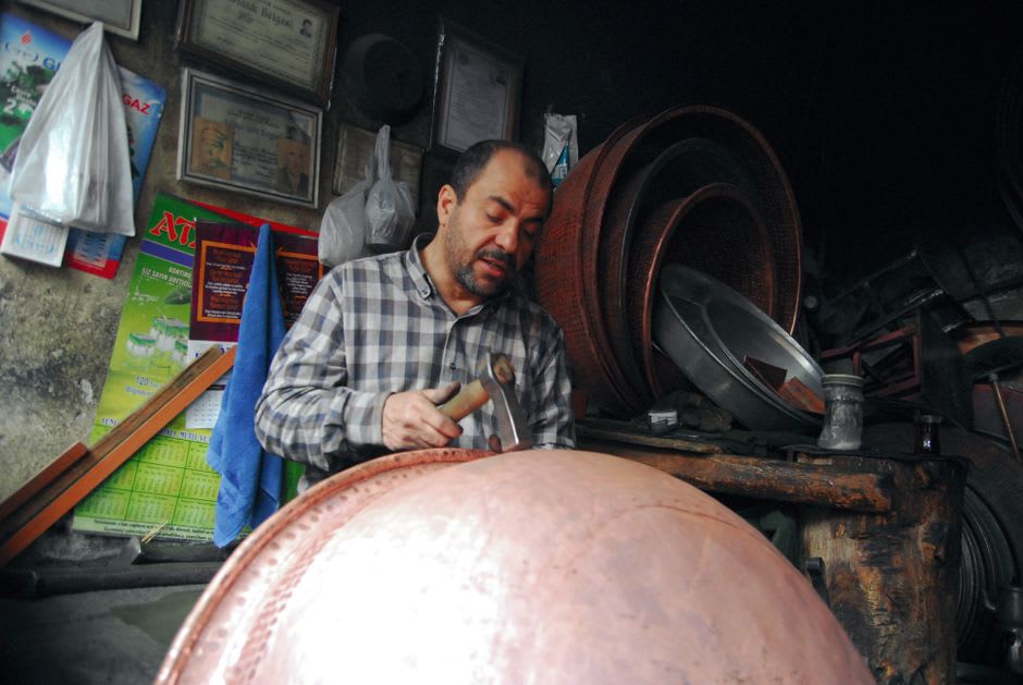Stalls and copper displays along the plaza during the National Copper Fair in Santa Clara del Cobre