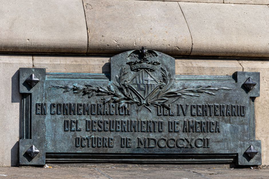 The memorial plaque and stone marker commemorating October 2, 1968 in the Plaza de las Tres Culturas, the colonial church of Santiago in the background