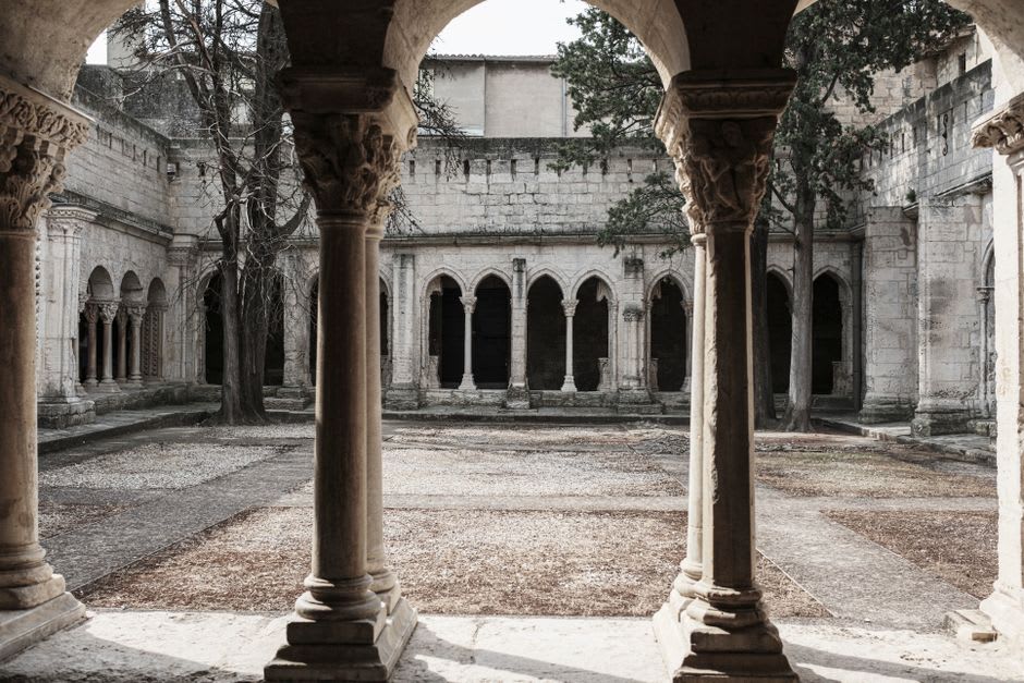 The atrium and open chapel of the Augustinian Ex-Convento de San Juan Bautista in Yecapixtla, stone walls catching morning light