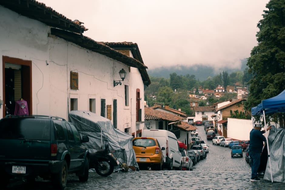 View from the hillside above Zacualpan looking toward colonial rooftops and surrounding mountains