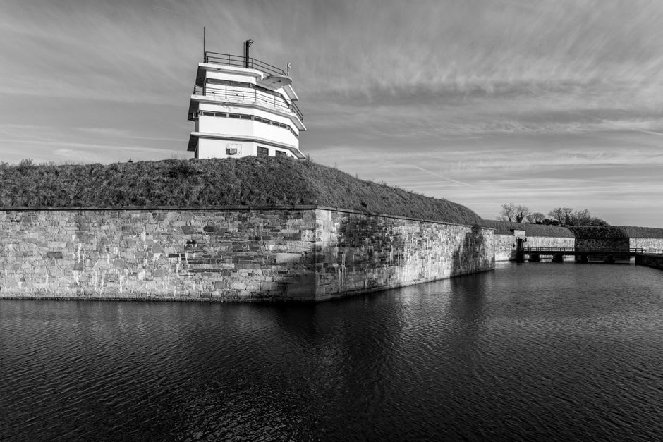 Stone ramparts of Bender Fortress overlooking the moat