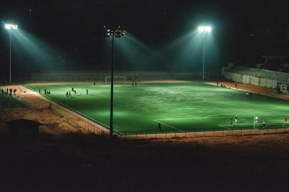 The illuminated pitch of Stade Louis II during an AS Monaco evening match