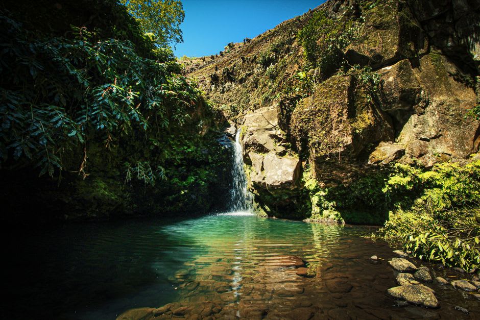 The 70-foot cascade of Great Alps Waterfall falling into a pool in Montserrat's Center Hills
