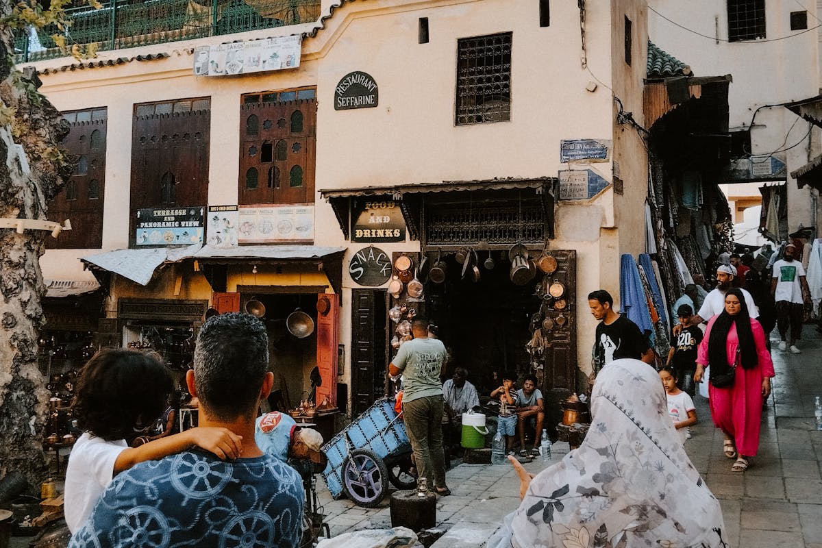 Narrow lanes and ornate doorways in the ancient medina of Fes