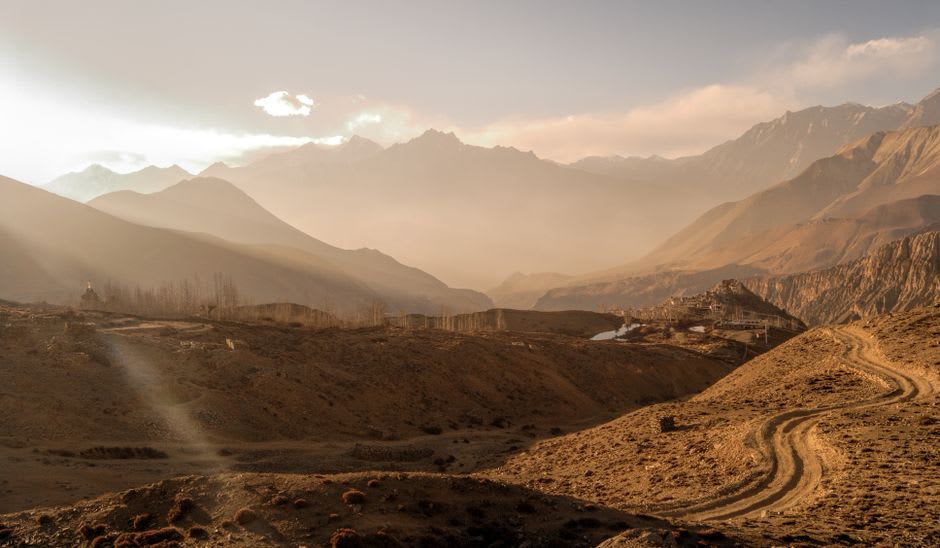 Evening market stalls along Jomsom's main street with traders from surrounding Mustang villages selling produce and goods