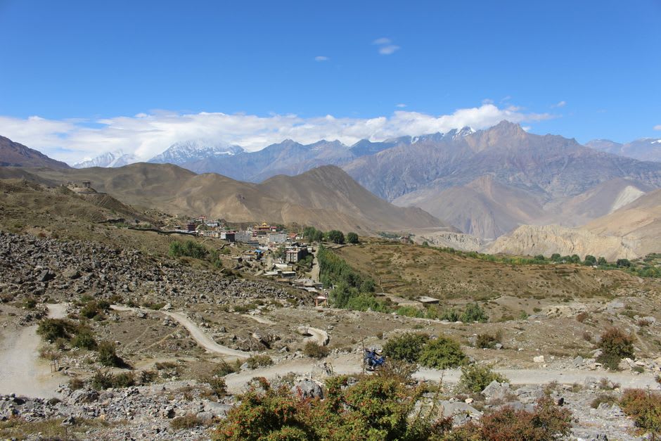 The eternal flame and spring at Jwala Mai shrine inside the Muktinath temple compound, tended by both Hindu and Buddhist worshippers