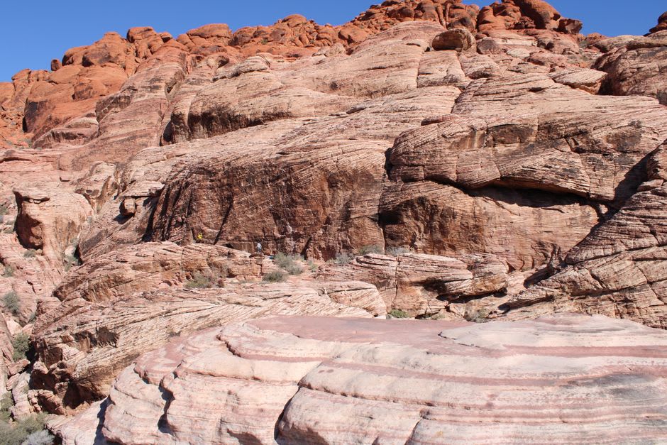 Rock climbers ascending a sandstone route on the cliffs of Red Rock Canyon