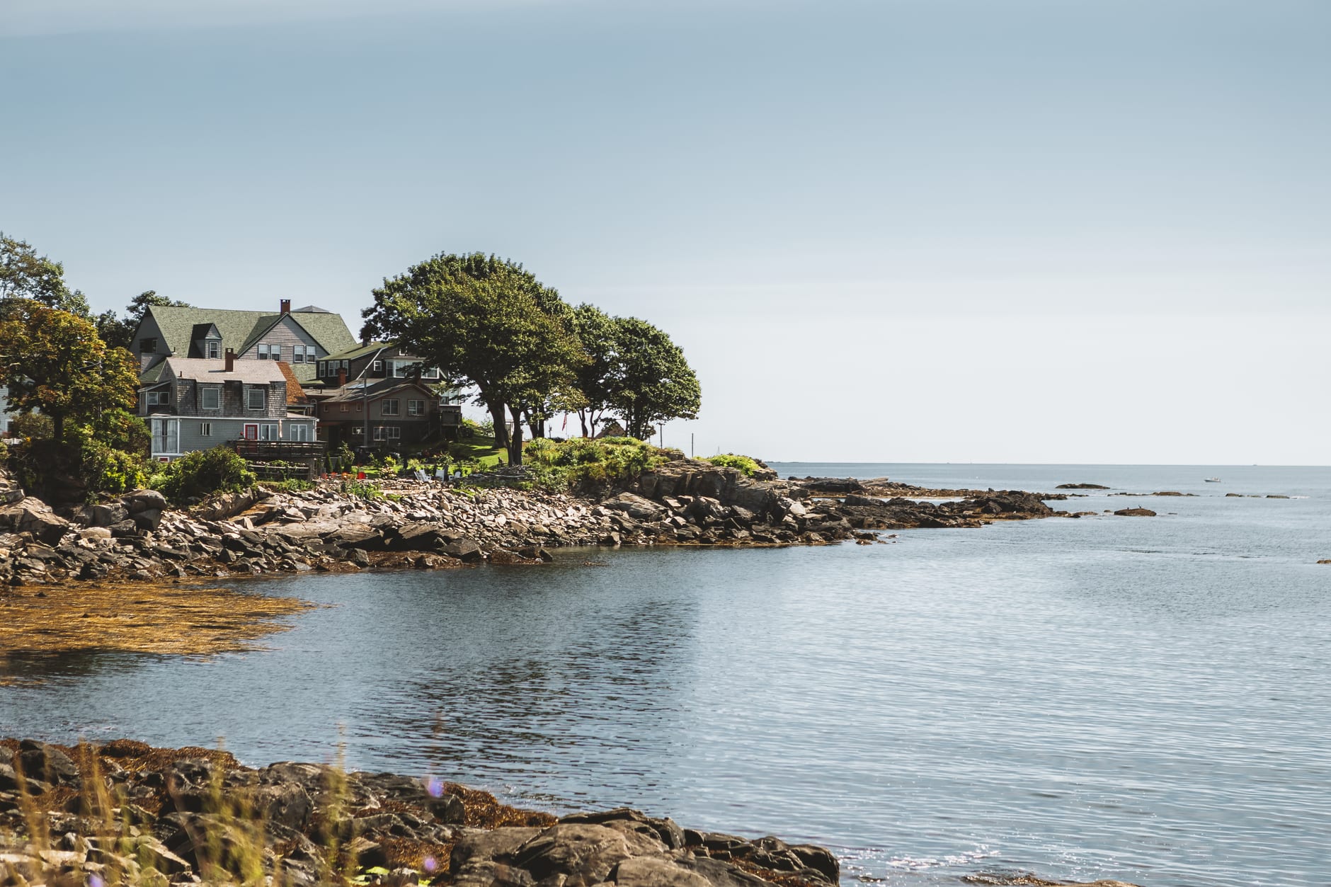 Portland Head Light perched on its rocky promontory at Cape Elizabeth, the Atlantic dark and wind-whitened below