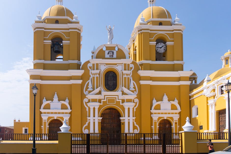 Colorful colonial church facade in Granada