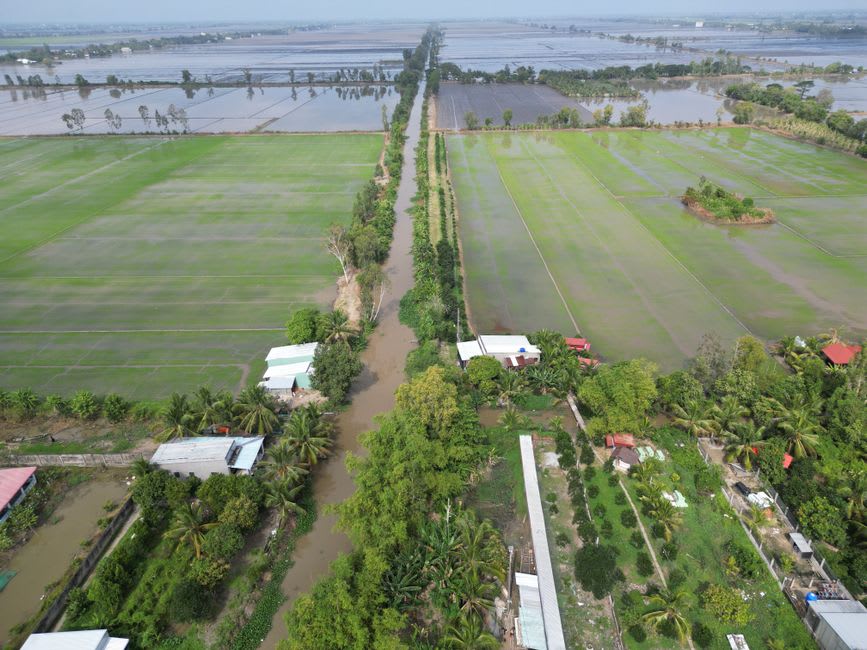 Local Delta village life alongside irrigation canals near the buried remains of ancient Sais