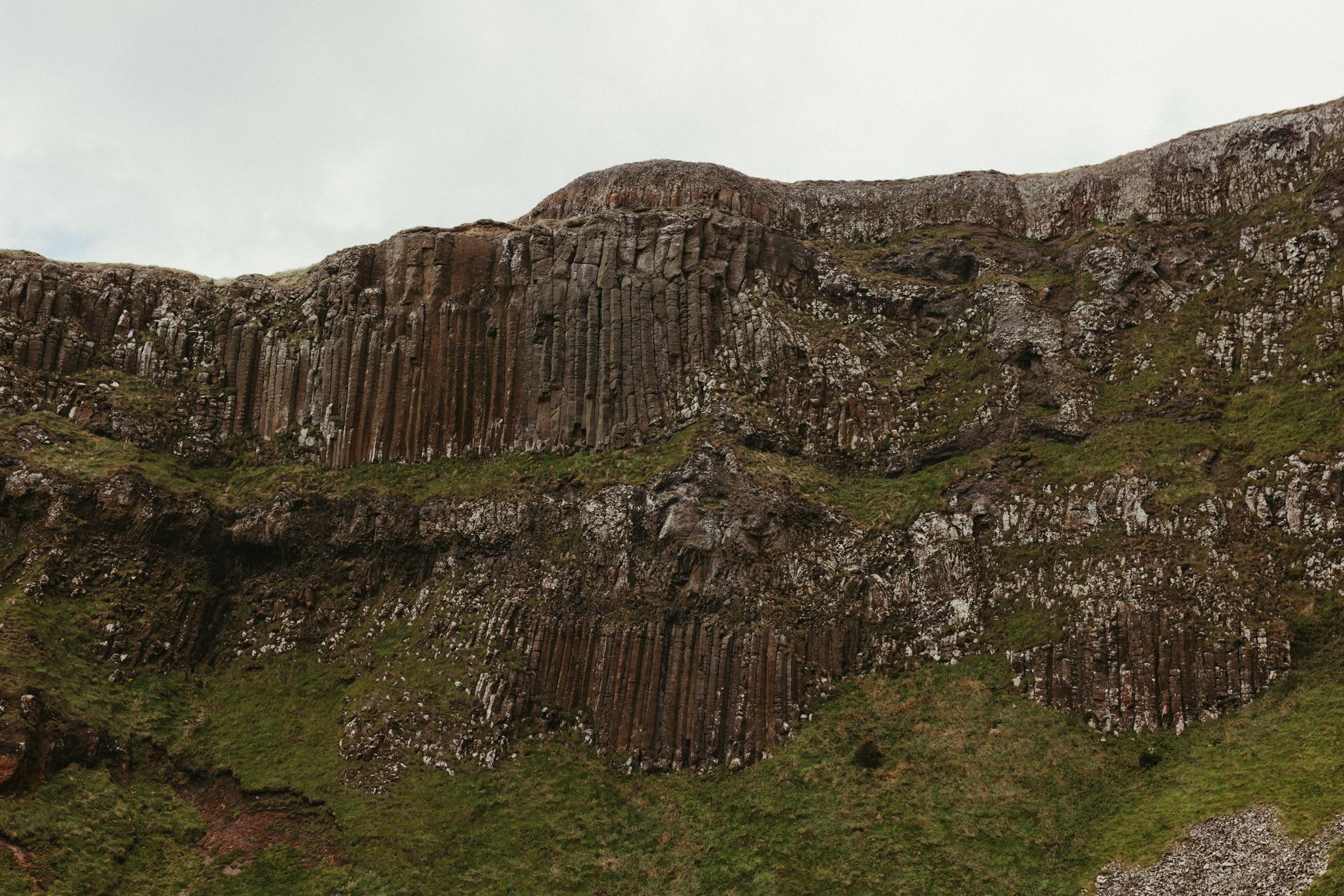 The Organ basalt formation: vertical columns stacked like pipes against a cliff face above the ocean